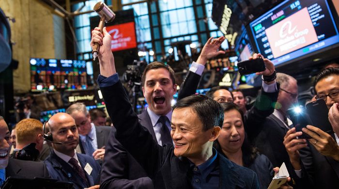 Alibaba founder Jack Ma celebrated the company’s listing at the New York Stock Exchange in 2014. PHOTO: ANDREW BURTON/GETTY IMAGES