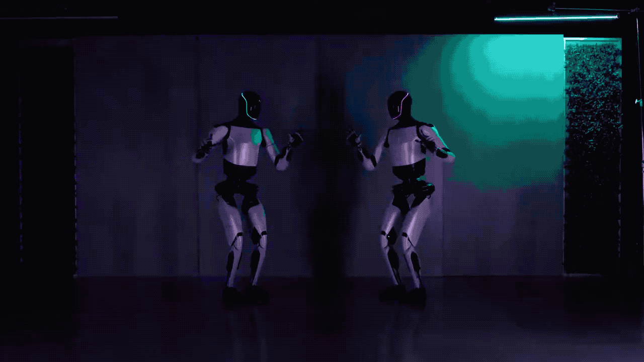 重磅！马斯克发布最强人形机器人Optimus二代，轻松抓鸡蛋、做深蹲，步行速度提升30%_老虎社区_美港股上老虎- 老虎社区, image size:1280x720