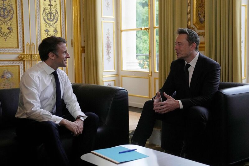 Emmanuel Macron, left, and Elon Musk during a meeting in Paris on May 15.Photographer: Michel Euler/AFP/Getty Images