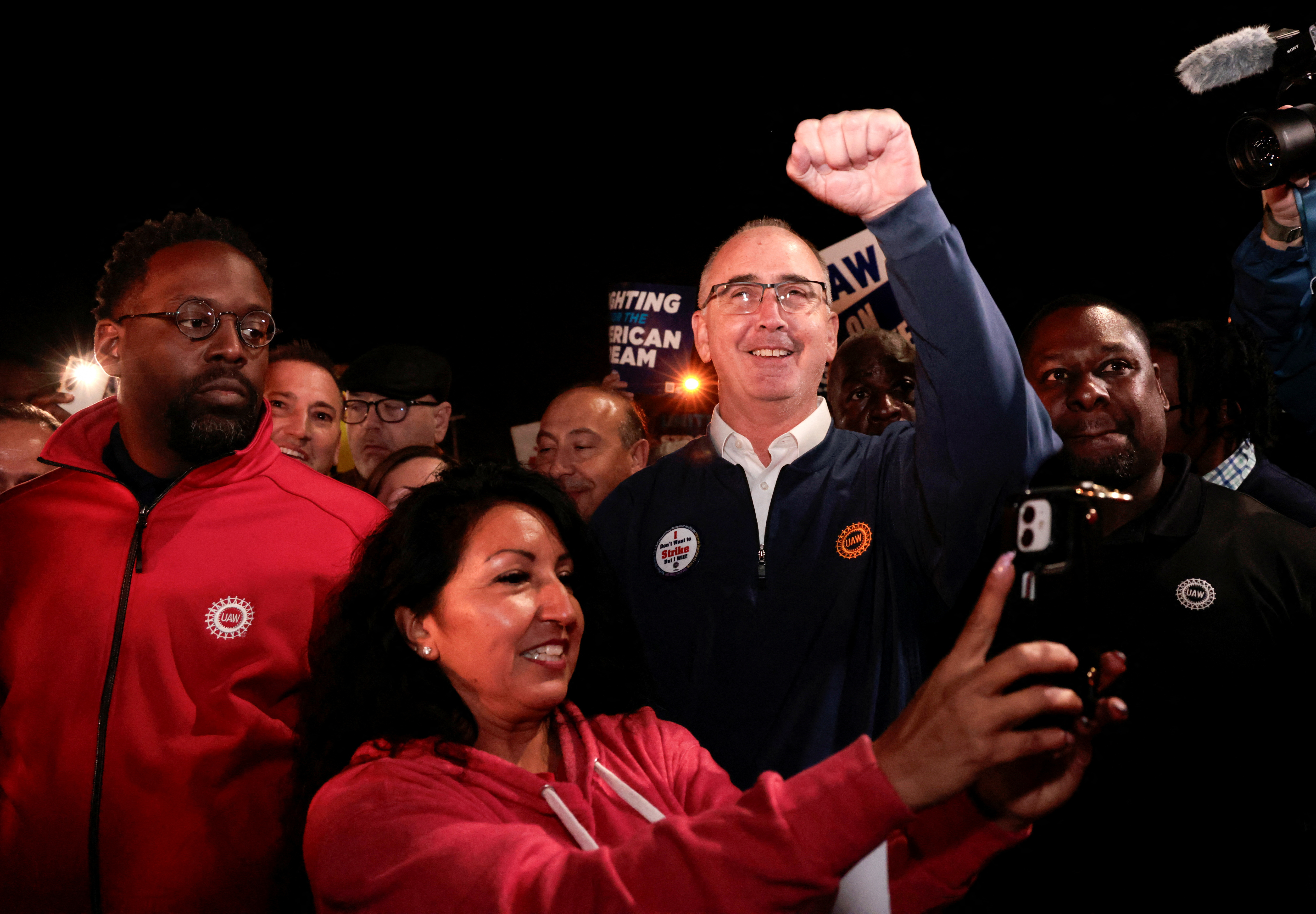 United Auto Workers union President Shawn Fain joins UAW members who are on a strike, on the picket line at the Ford Michigan Assembly Plant in Wayne, Michigan, September 15, 2023. 