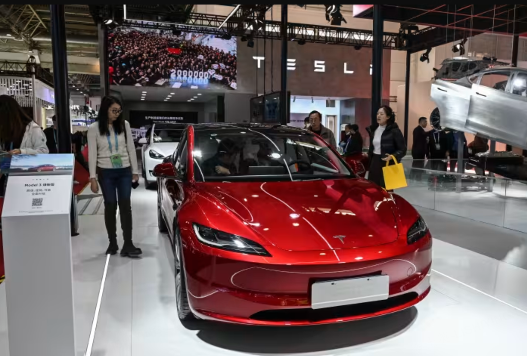 A Model 3 at an exposition in Beijing in December. Starting at nearly $40,000, the EV is not exactly geared to the masses. But retail investors are keen to know more about the less expensive Model 2.