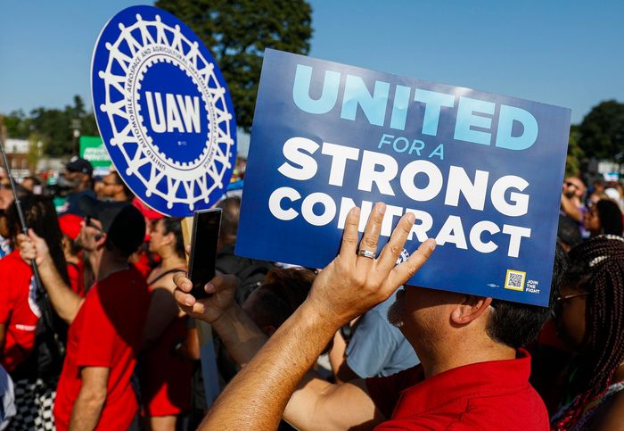 United Auto Workers members and others gather for a rally after marching in the Detroit Labor Day Parade on Sept. 4. UAW members are now on strike.